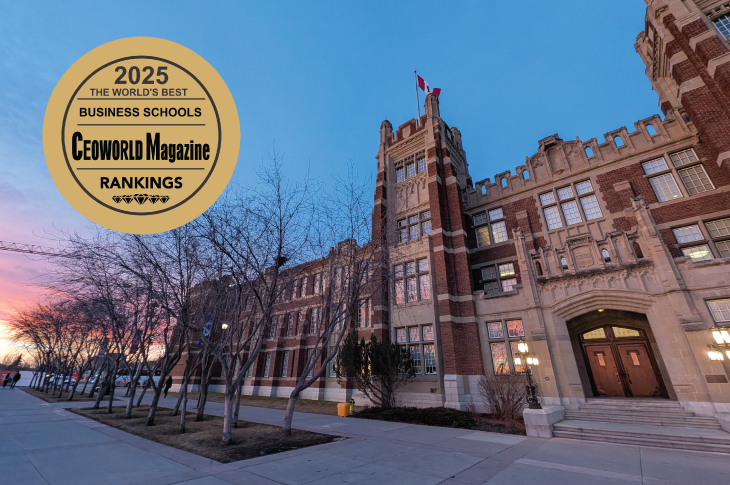 At golden hour, a colourful sunset sets the backdrop for Heritage Hall on SAIT's campus.